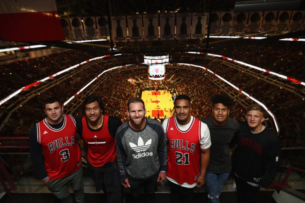 All Blacks players attend an NBA basketball game.