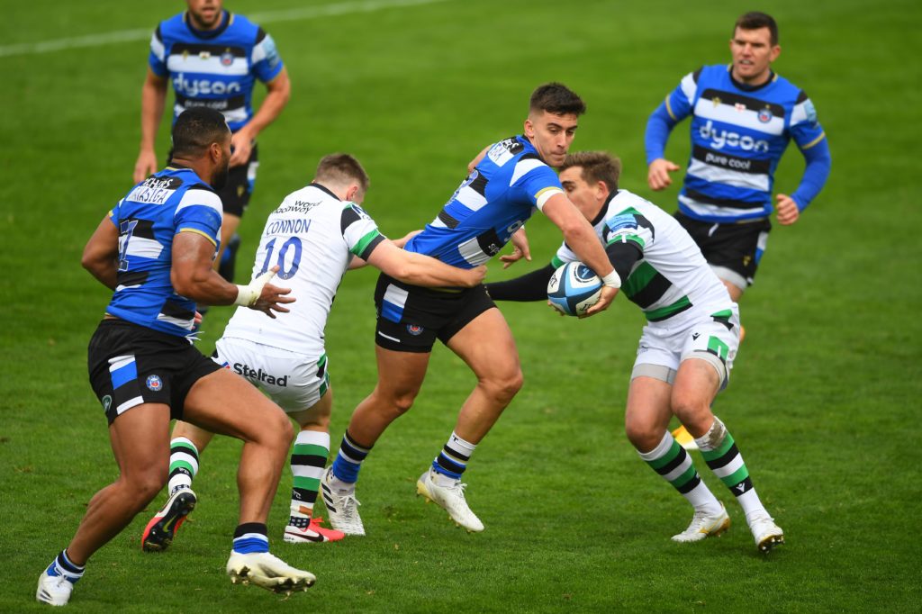 Bath's Cam Redpath off-loads out of a tackle against Newcastle