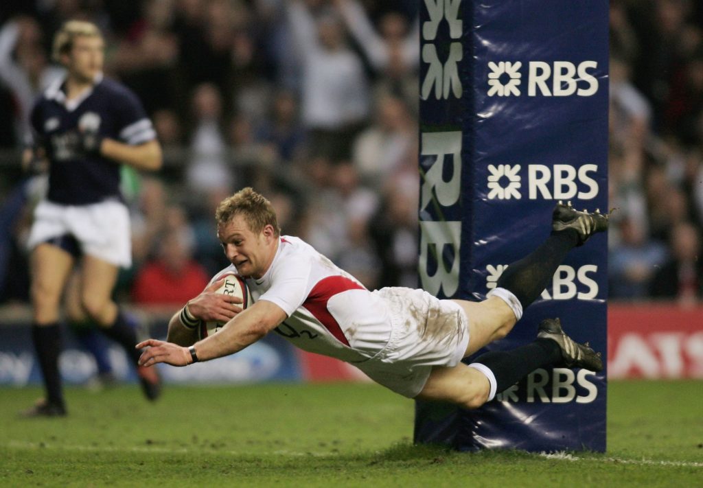 Jamie Noon scores a try for England against Scotland