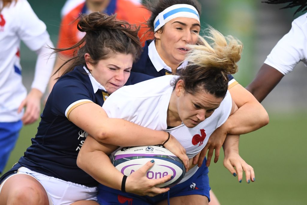 Lise Arricastre of France is tackled b Scotland's Lisa Thomson