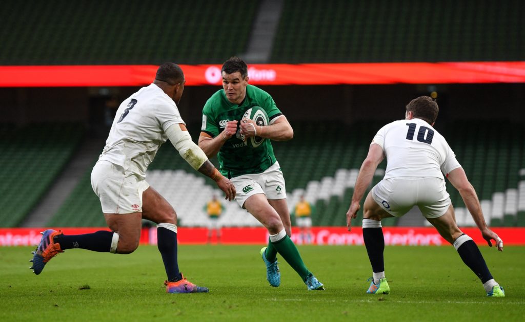 Johnny Sexton of Ireland carries ball at the English defence