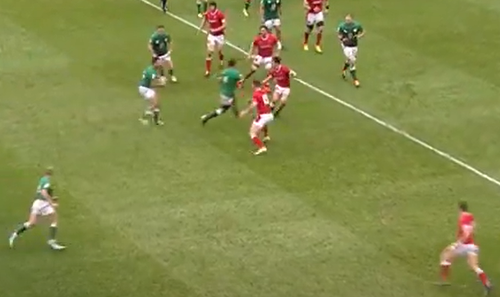 George North rushes up to defend